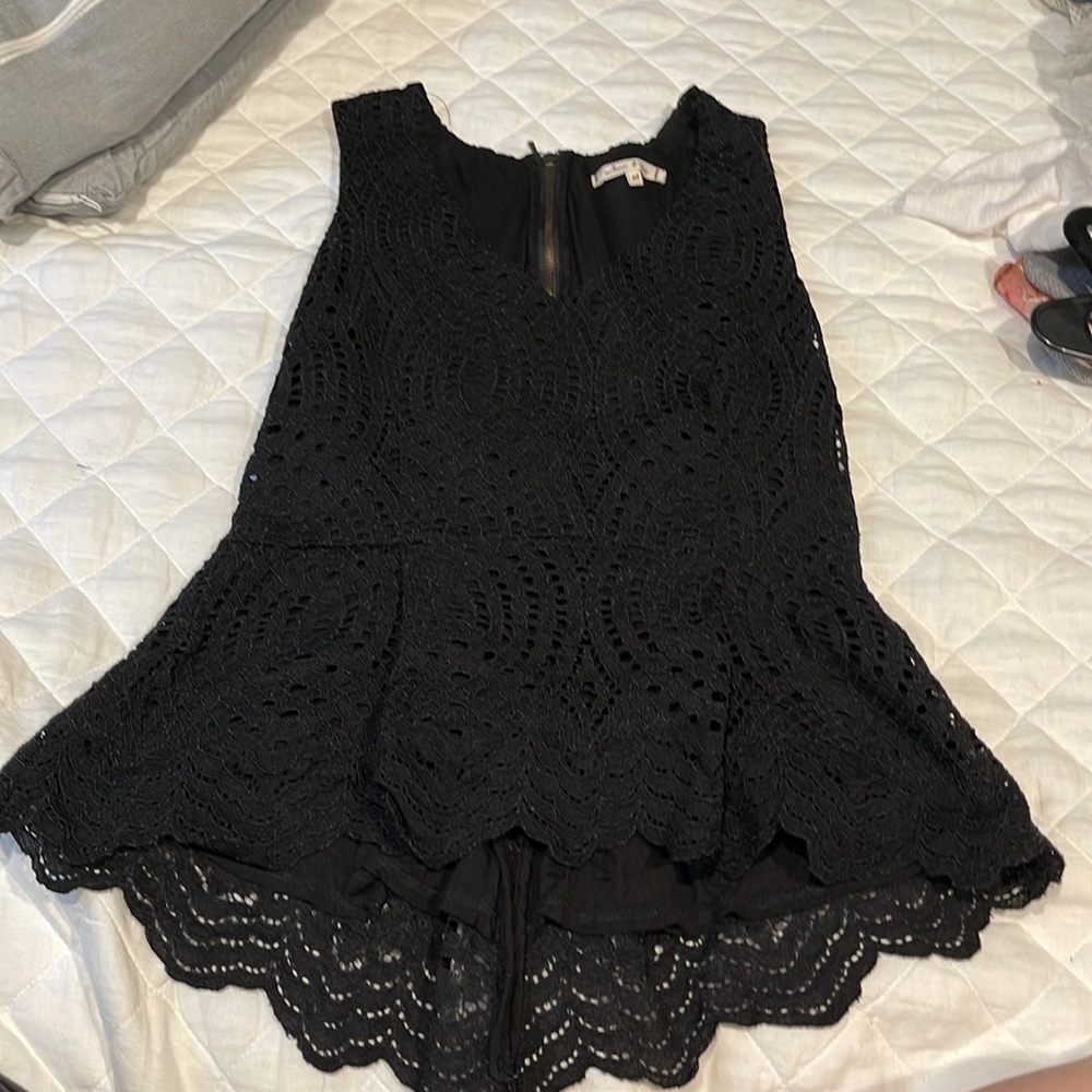 Black eyelet detail peplum tank